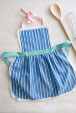 Lace apron for girls, styled