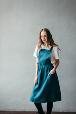 Linen apron for women, styled in the kitchen
