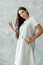 Linen smock apron worn by a maker