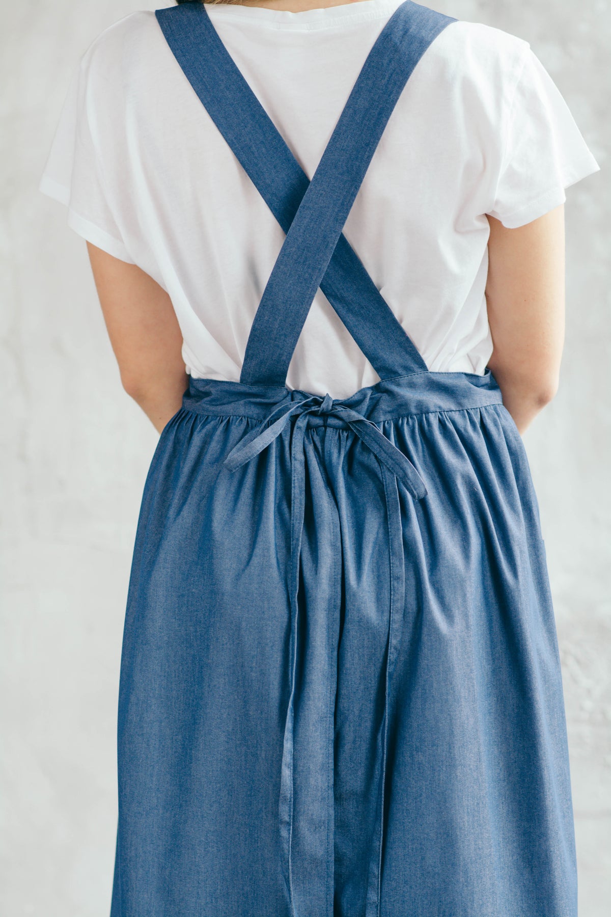 Denim apron dress, pocket detail