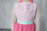 Matching family lace aprons, styled