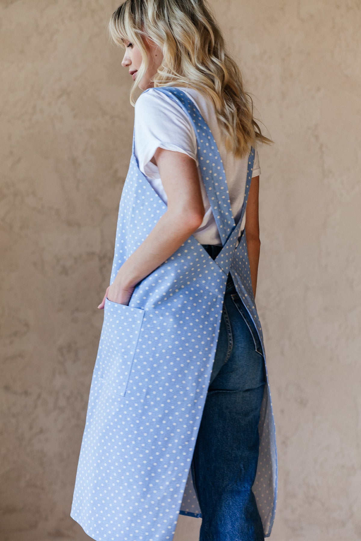 Checked cotton pinafore apron, front view