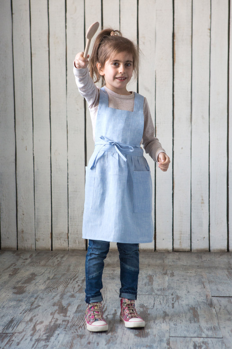 Blue linen pinafore apron, front view