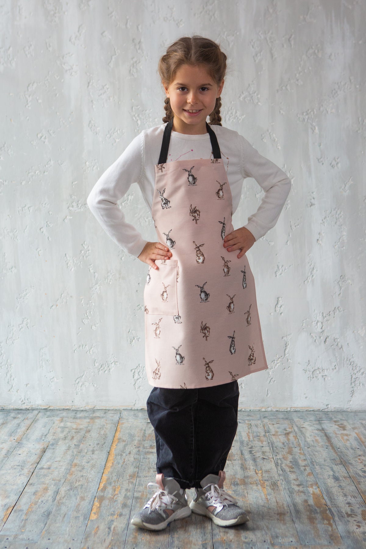 Bunny print apron for children, styled