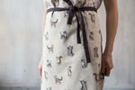 Cat print apron on child, cotton canvas