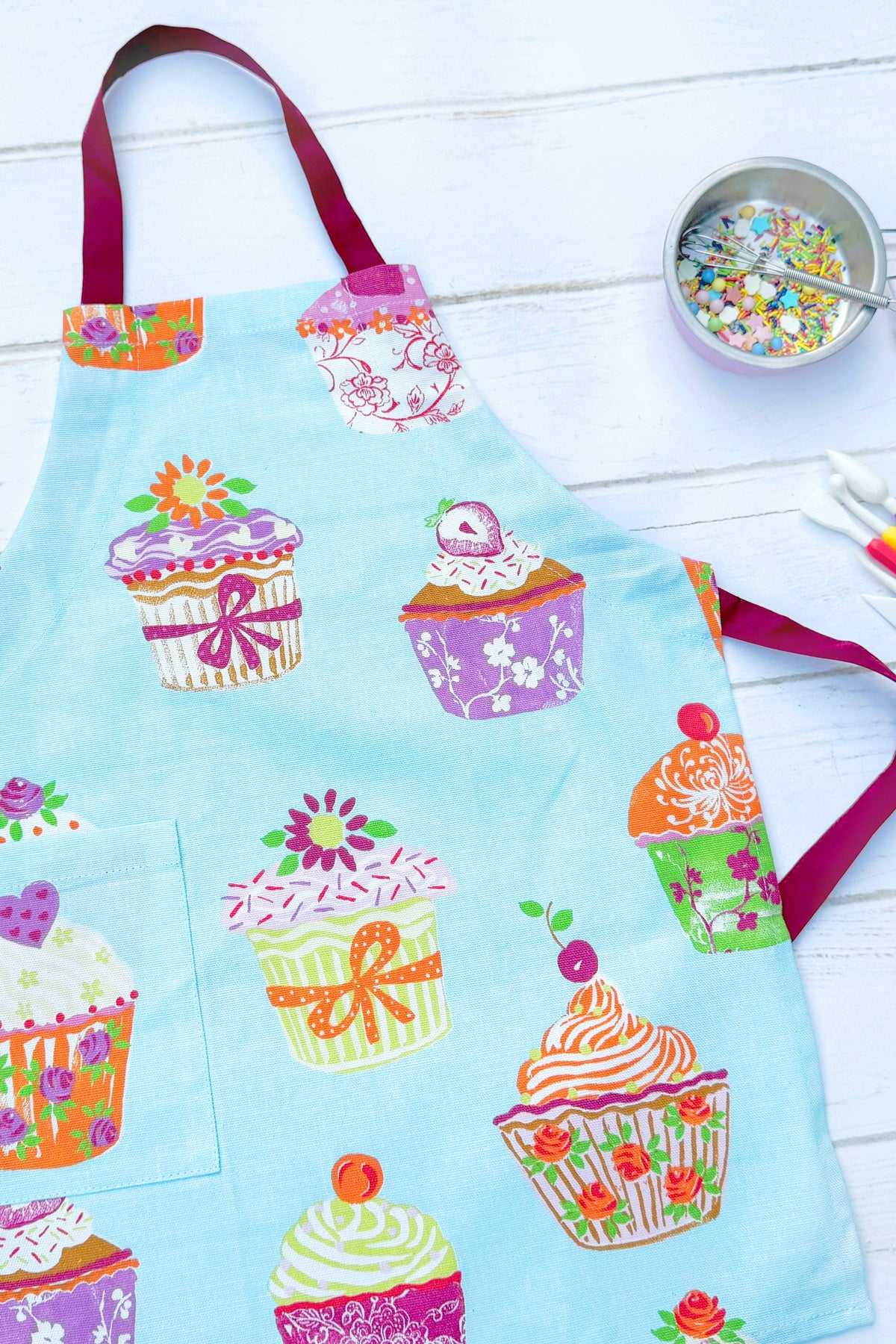 Blue and pink cupcake print apron for the kitchen