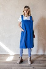 Cotton canvas pinafore apron in cornflower blue