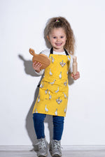 Duck print kids apron in blush, front view