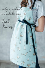 Duck print apron, close view of the pocket and print