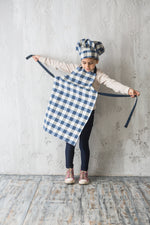 Blue gingham check apron, full length view