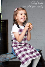 Purple check kids apron, styled