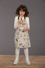 Cat print kids apron in grey, styled