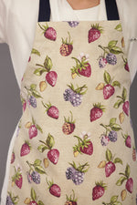 Kids strawberry print apron worn while baking
