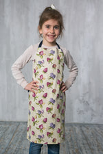 Kids apron in printed cotton canvas, detail