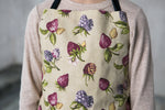 Kids chef apron with contrasting strap, styled