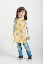 Childrens chef apron in printed canvas, full length