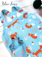 Blue foxes print pinafore apron for a child