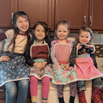 Lace aprons for girls in printed designs
