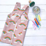 Pink rainbow cross back apron for children