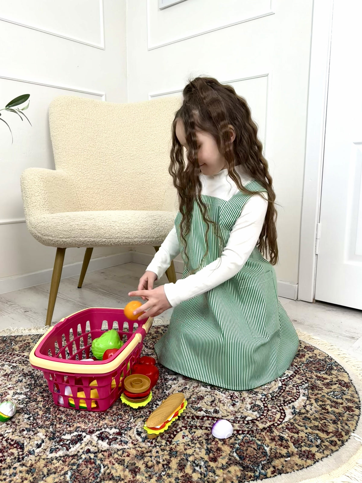 Green stripe craft apron for children, full length