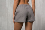 Linen pyjama shorts styled for warm nights