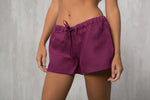 Linen pyjama shorts styled with a linen cami