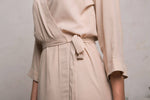 Nude crepe short robe, belt tied at the waist