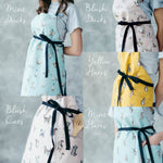 Printed animal aprons in cat, dog, duck and hare designs