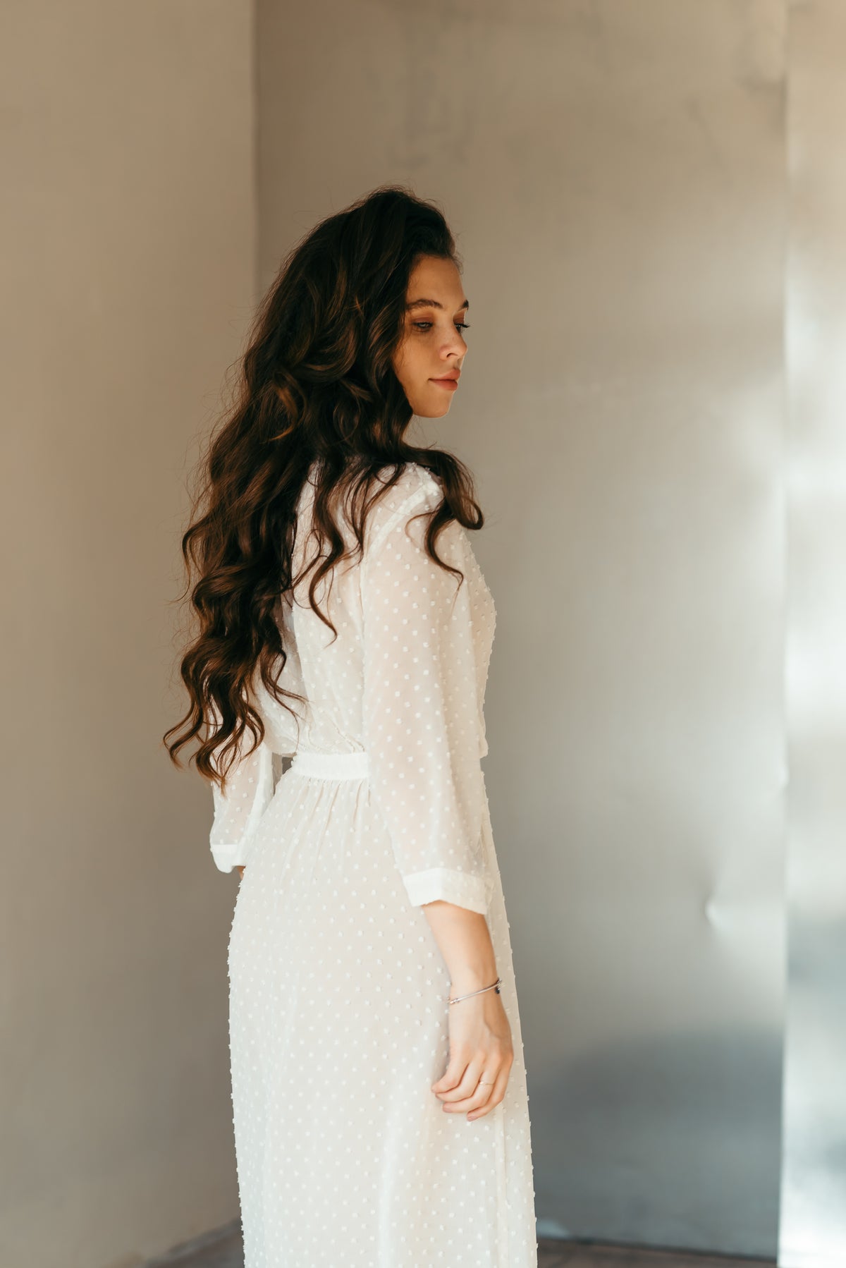 Ivory sheer kimono robe, belt tied at the waist