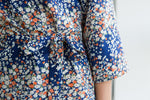 Short floral kimono robe worn open over nightwear