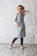 Unisex toddler apron in grey stars print, chef style with pocket