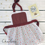 Girls lace apron with lace trim, styled