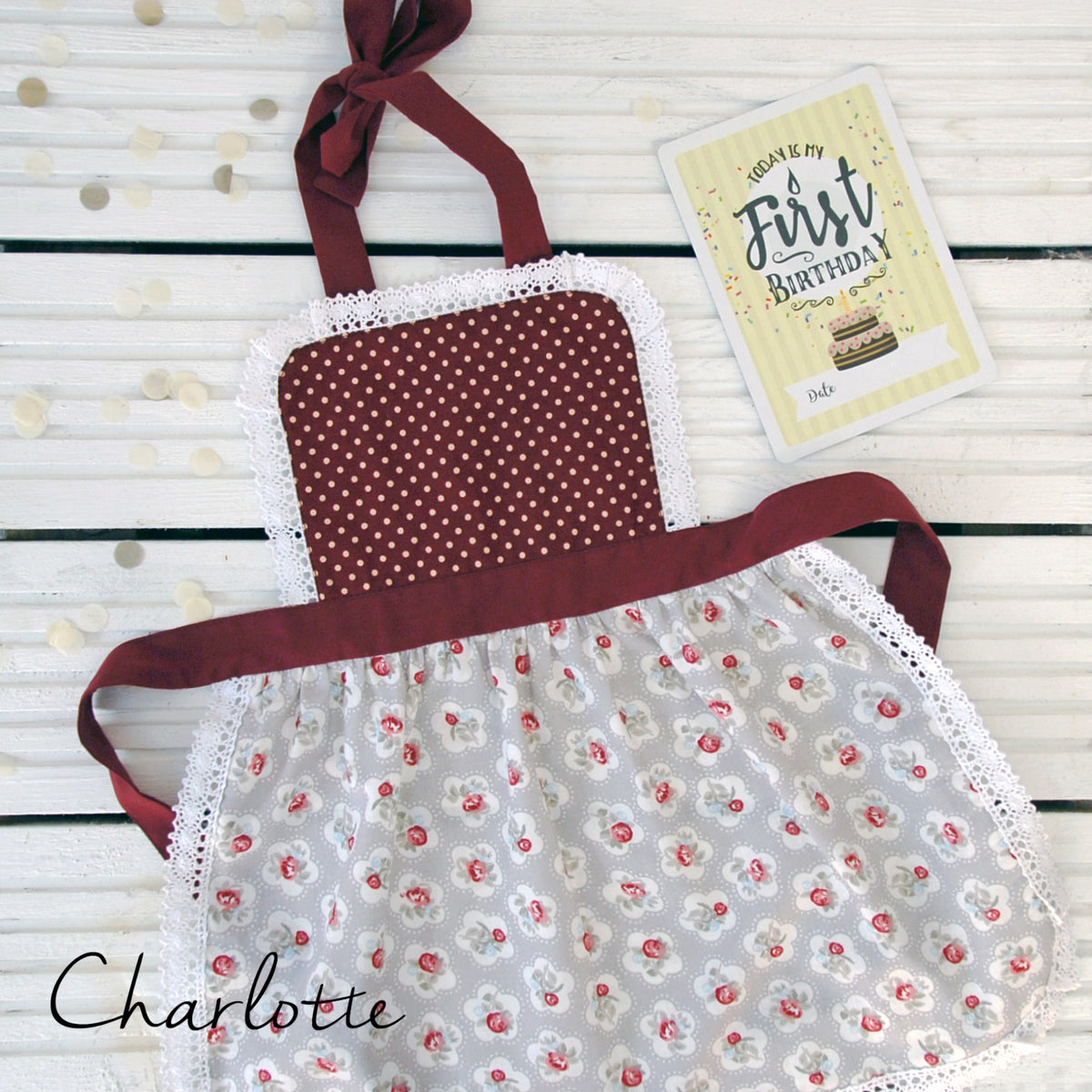 Girls lace apron with lace trim, styled