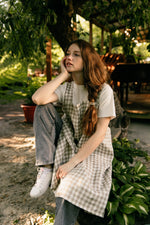 Checked linen pinafore apron, checked weave detail