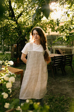 Checked linen pinafore apron, pocket detail