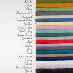 Linen robe colourway close-up, natural texture