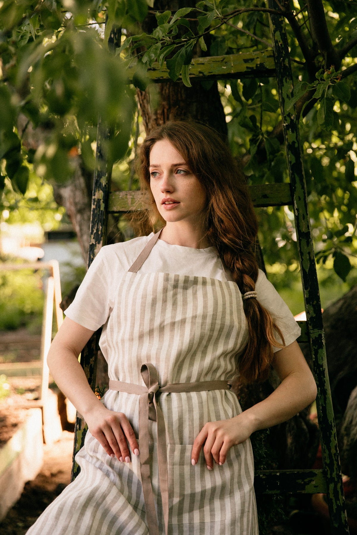 Limited edition taupe stripe linen apron, full length back view