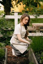 Cream and taupe striped linen apron, neck strap and waist tie detail